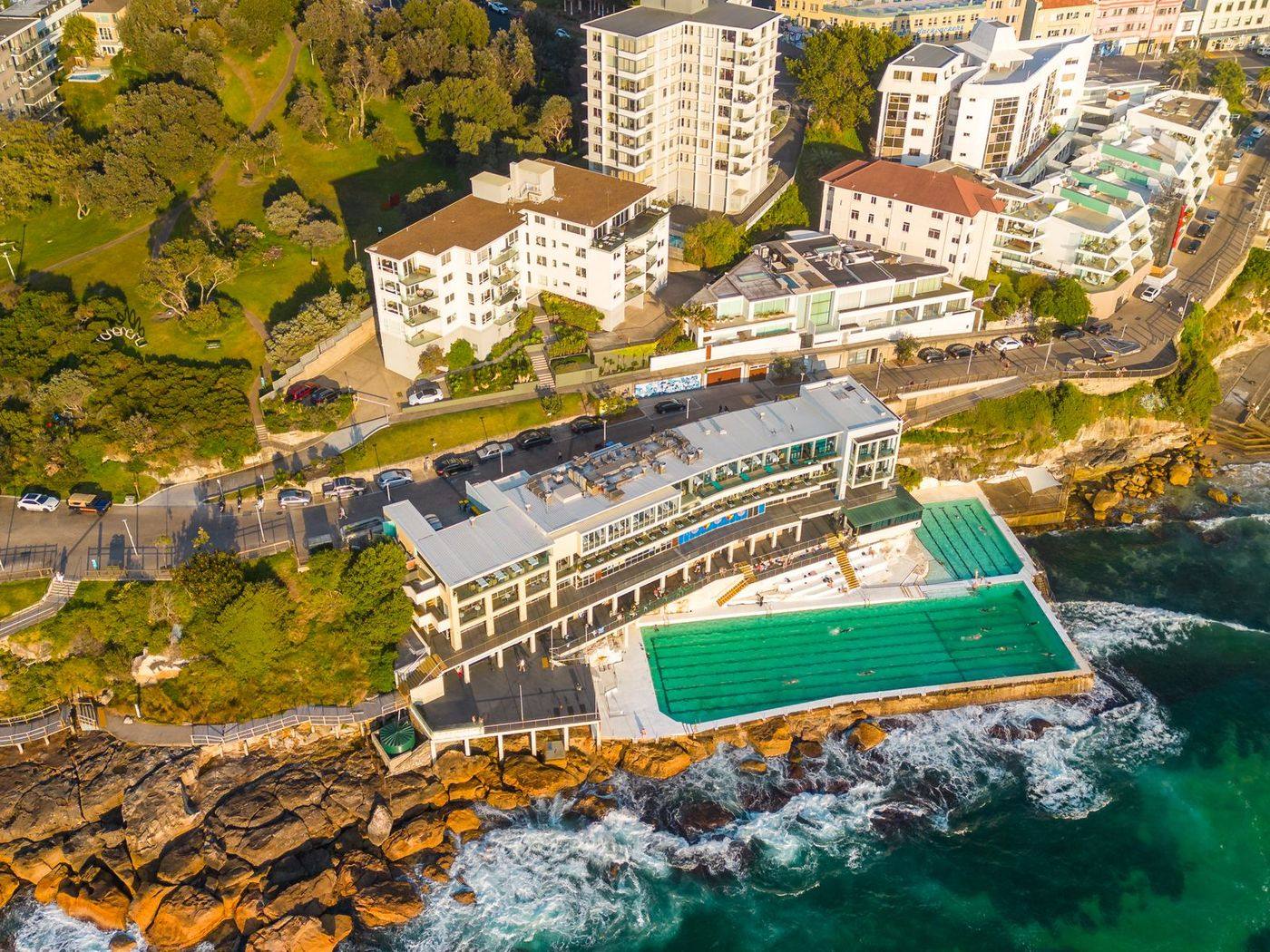 Aerial view of Bondi Beach apartments above the Icebergs pool