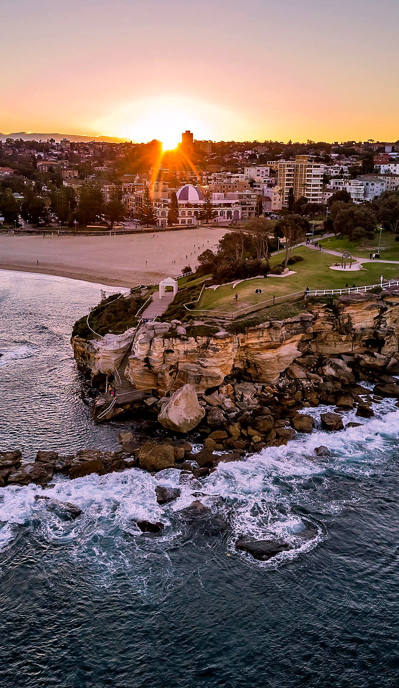 Coogee Beach, the pavilion and the headland at sunset, seen from the air