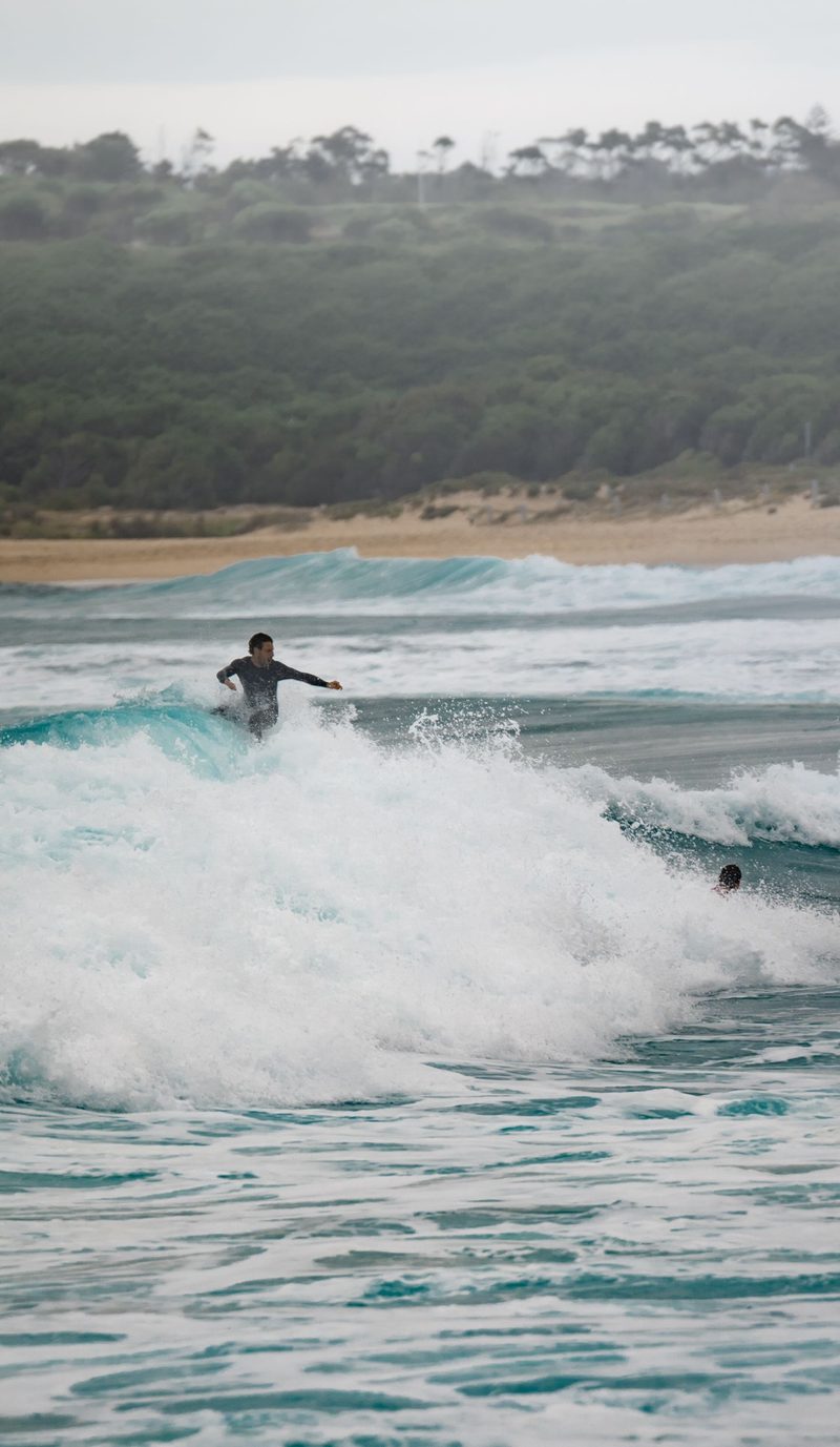Surfer on waves at Maroubra Beach, Sydney