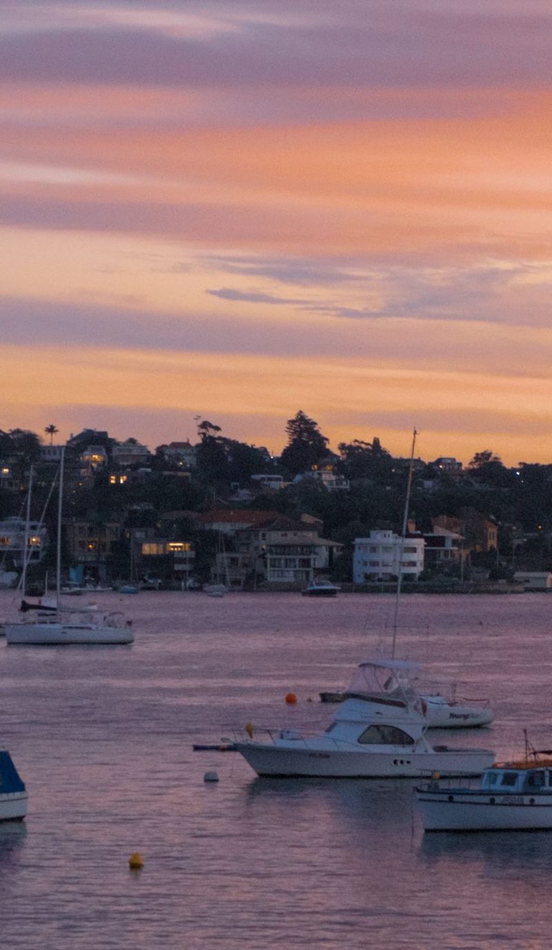 Boats moored at Rose Bay at sunset on Sydney Harbour